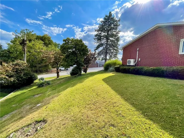 a view of a backyard with a garden