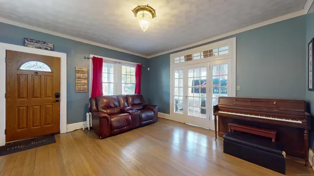 a living room with furniture and a window