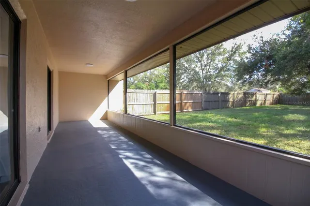 a view of porch with a yard
