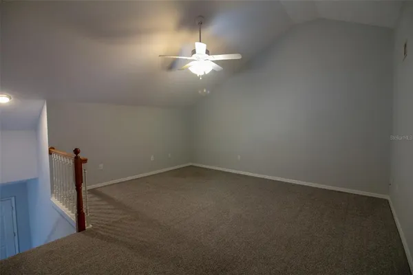 a view of a room with a fan