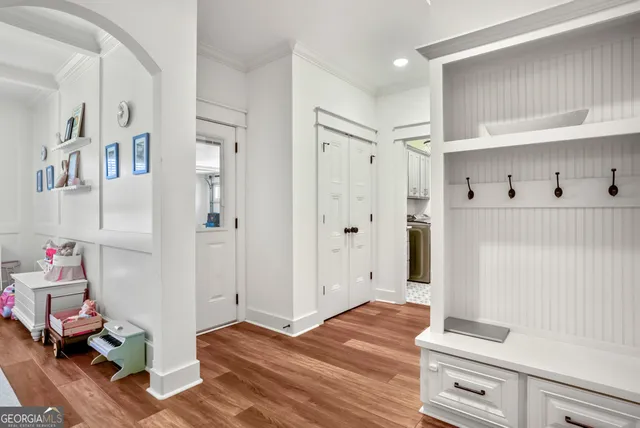 a bedroom with furniture and a window