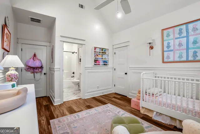 a bedroom with a bed and furniture