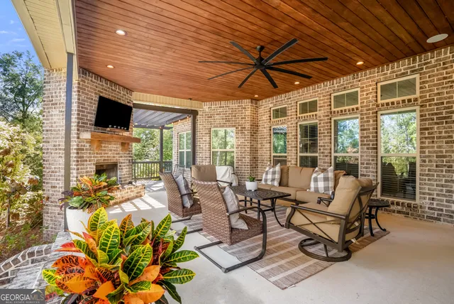 a living room with patio furniture