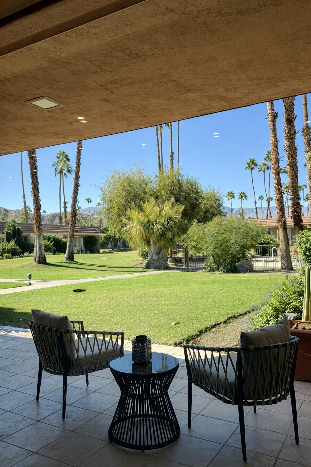 45565 Pima Road Indian Wells, CA 92210 - Photo 17 of 30 a view of a chairs and table on the patio