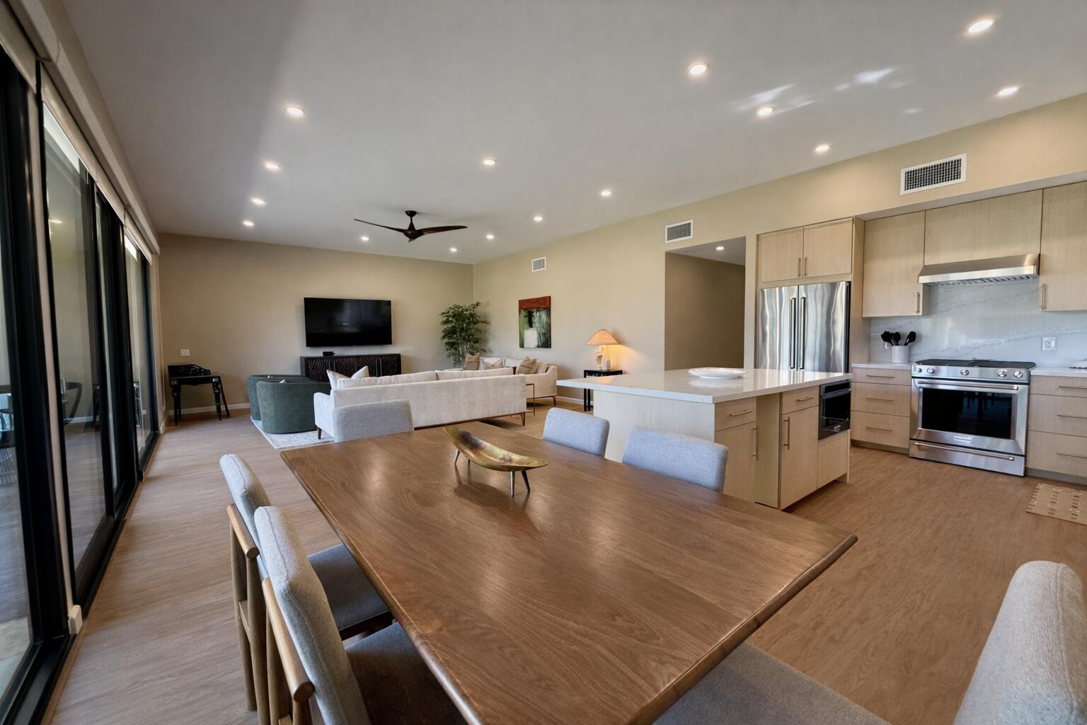 45565 Pima Road Indian Wells, CA 92210 - Photo 7 of 30 a large kitchen with kitchen island a large counter top appliances a sink and a center island