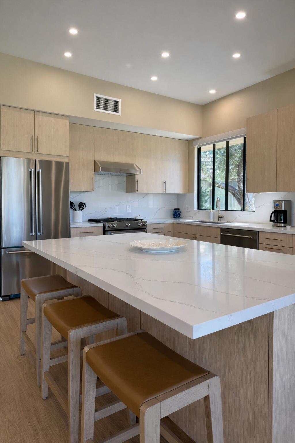 45565 Pima Road Indian Wells, CA 92210 - Photo 8 of 30 a kitchen with granite countertop a stove a sink and a refrigerator
