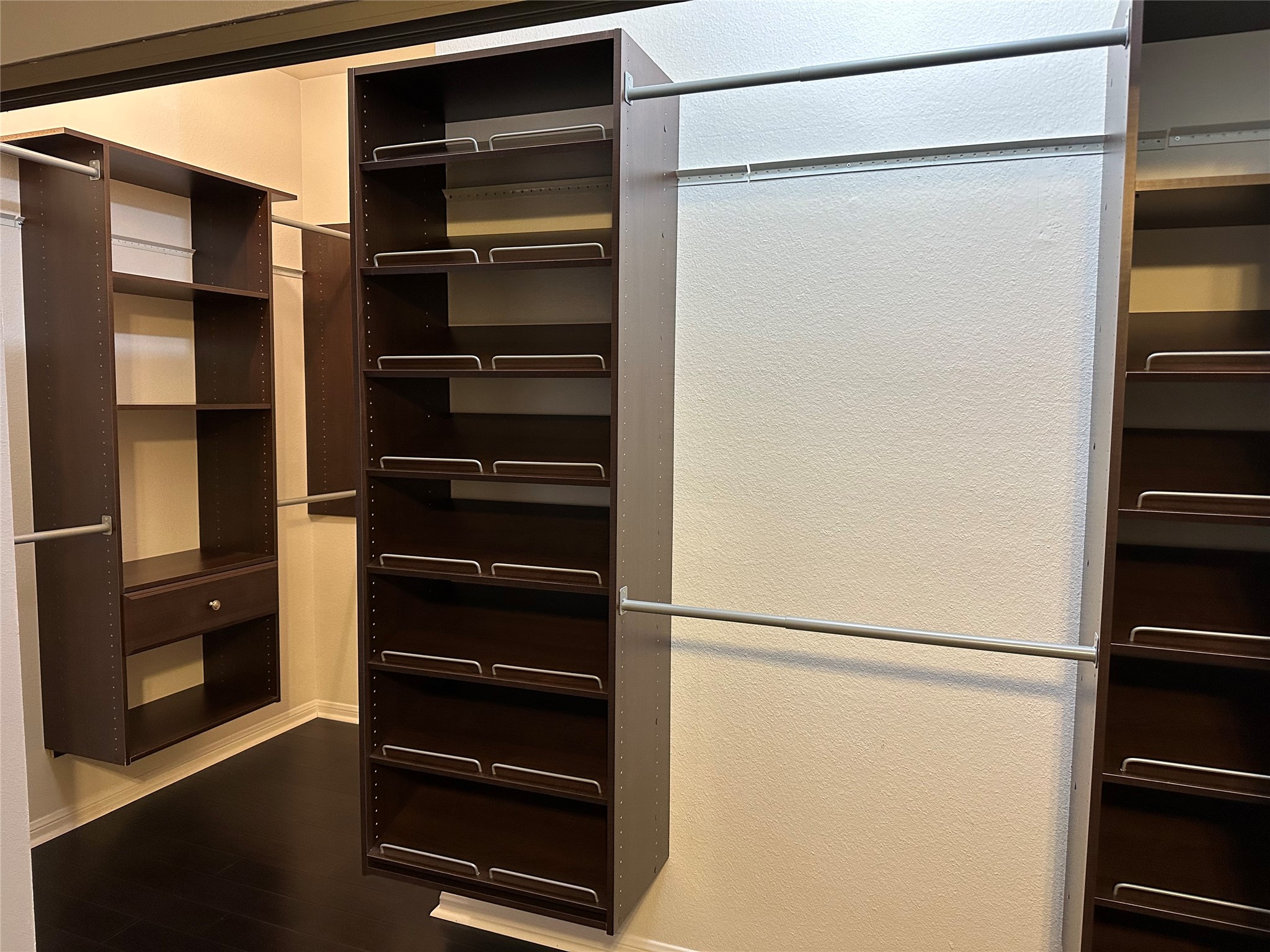 3800 Tanglewilde Street, Unit 504 Houston, TX 77063 - Photo 7 of 20 a view of walk in closet with empty racks