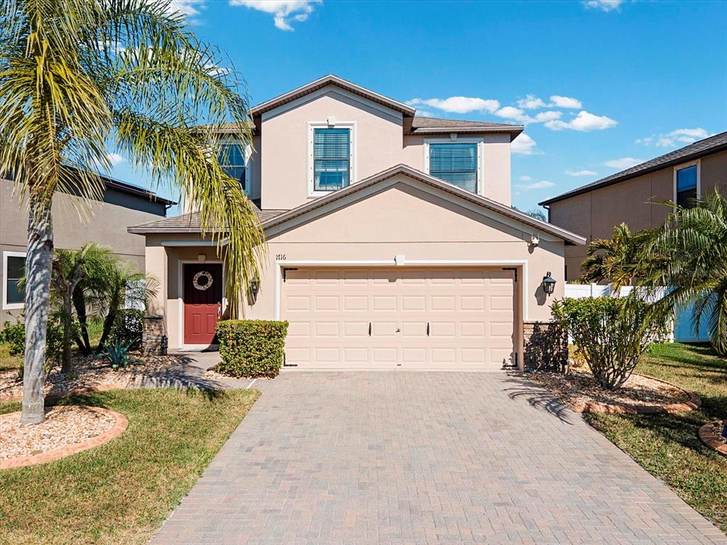 1716 Hadden Hall Place Trinity, FL 34655 - Photo 4 of 75 a view of a house with a yard