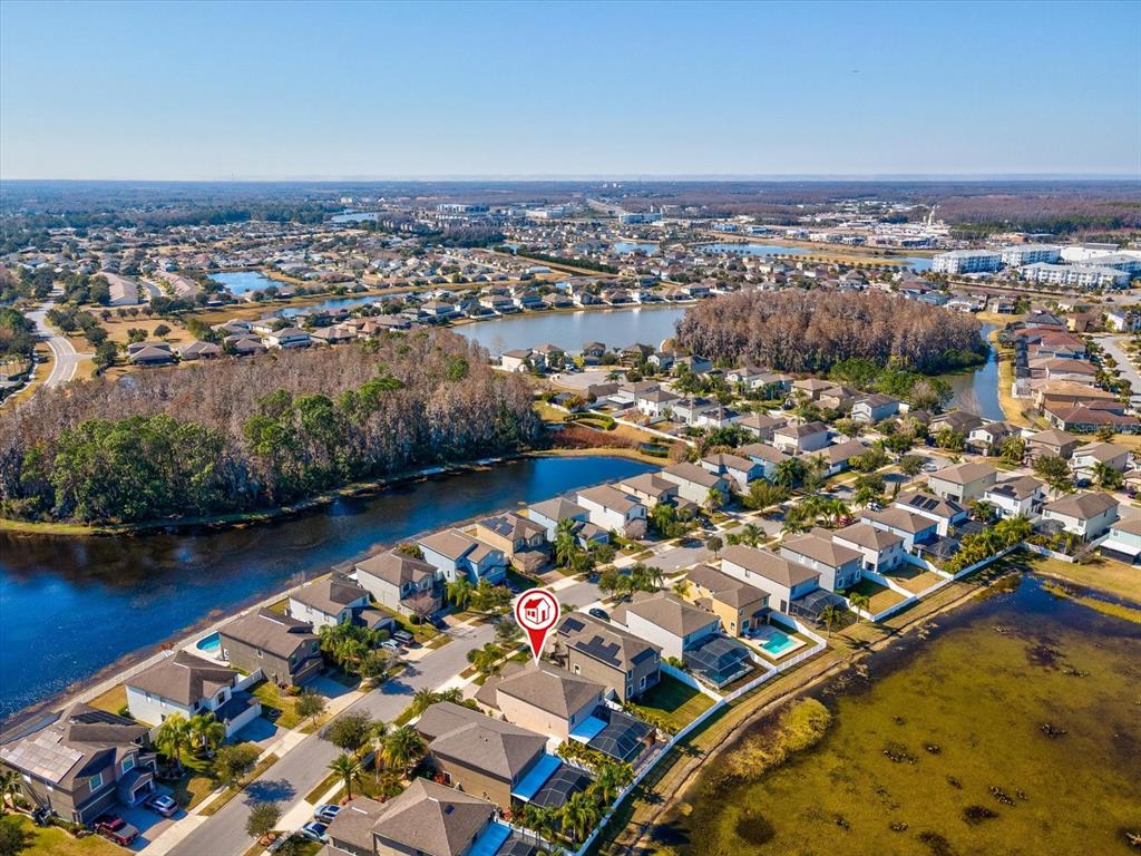 1716 Hadden Hall Place Trinity, FL 34655 - Photo 67 of 75 an aerial view of residential houses with outdoor space and river