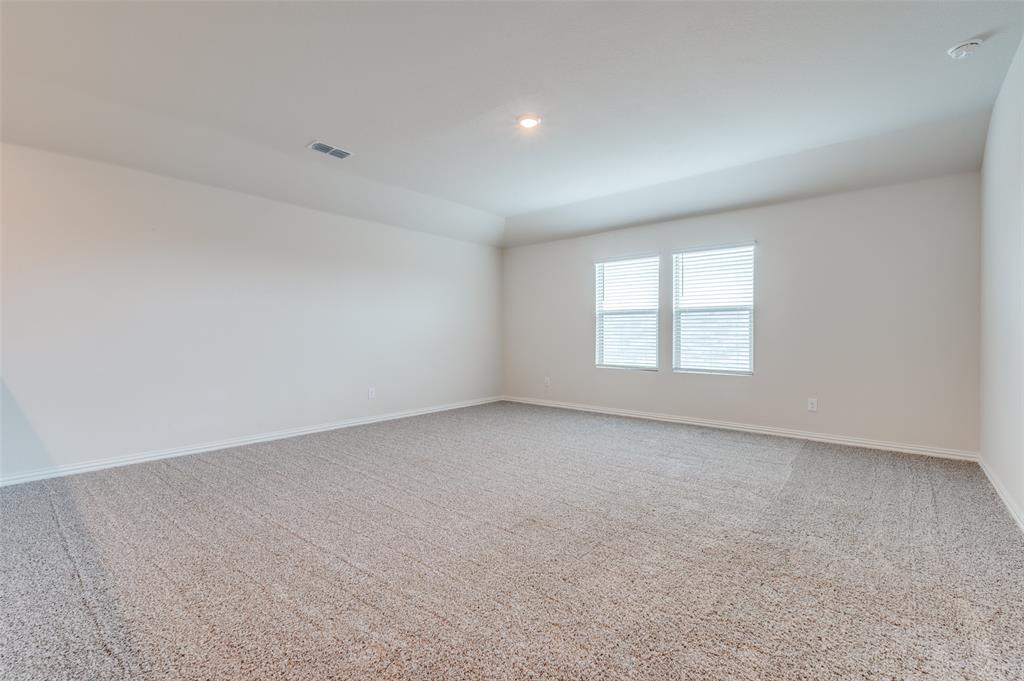3308 Kingsdown Drive Denton, TX 76207 - Photo 20 of 25 an empty room with a window