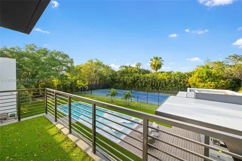 a view of outdoor space with deck and yard