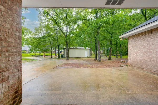 a view of backyard with swimming pool and outdoor seating