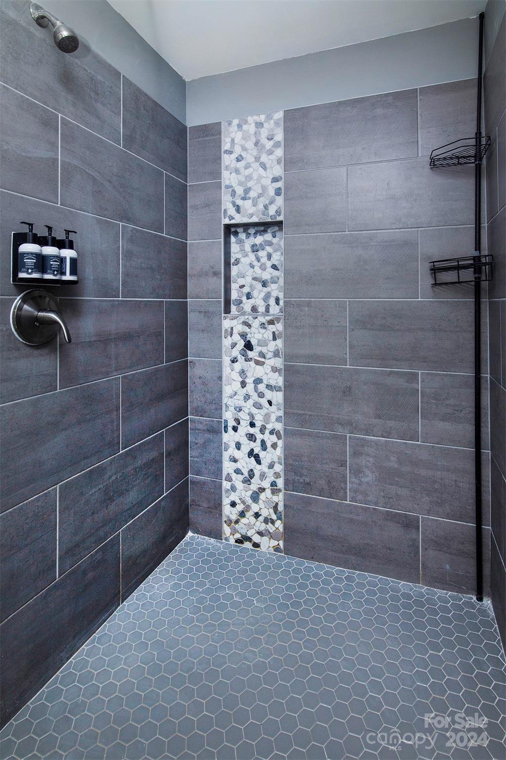 3741 Woodleaf Road Charlotte, NC 28205 - Photo 13 of 31 a bathroom with a shower