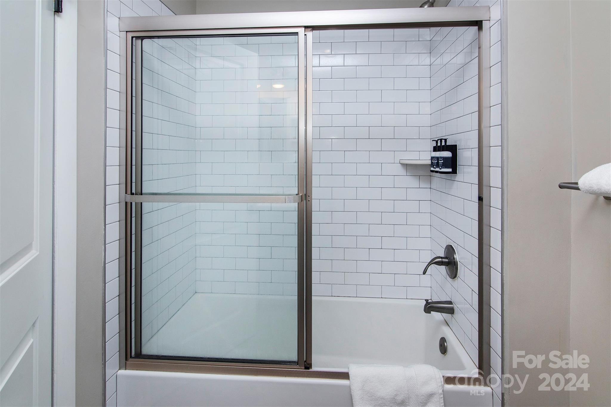 3741 Woodleaf Road Charlotte, NC 28205 - Photo 16 of 31 a bathroom with a shower