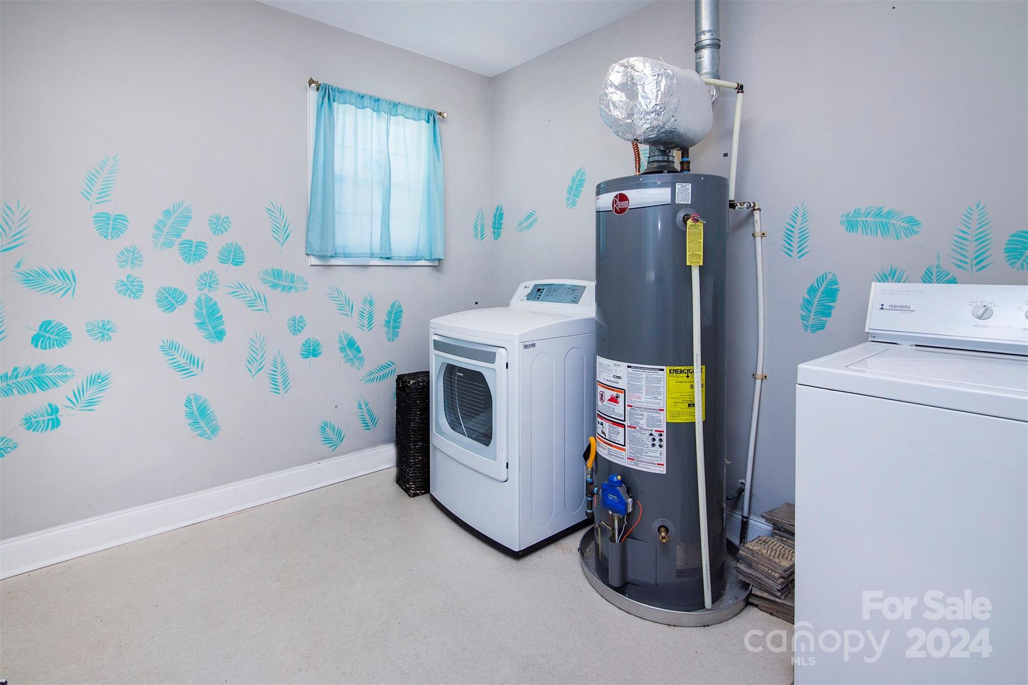 3741 Woodleaf Road Charlotte, NC 28205 - Photo 18 of 31 a view of storage and utility room with washer and dryer