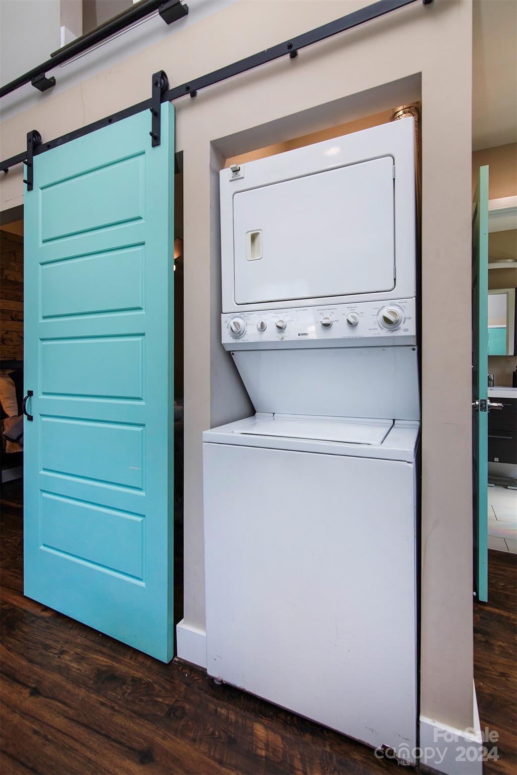 3741 Woodleaf Road Charlotte, NC 28205 - Photo 25 of 31 a close up view of a washer and dryer