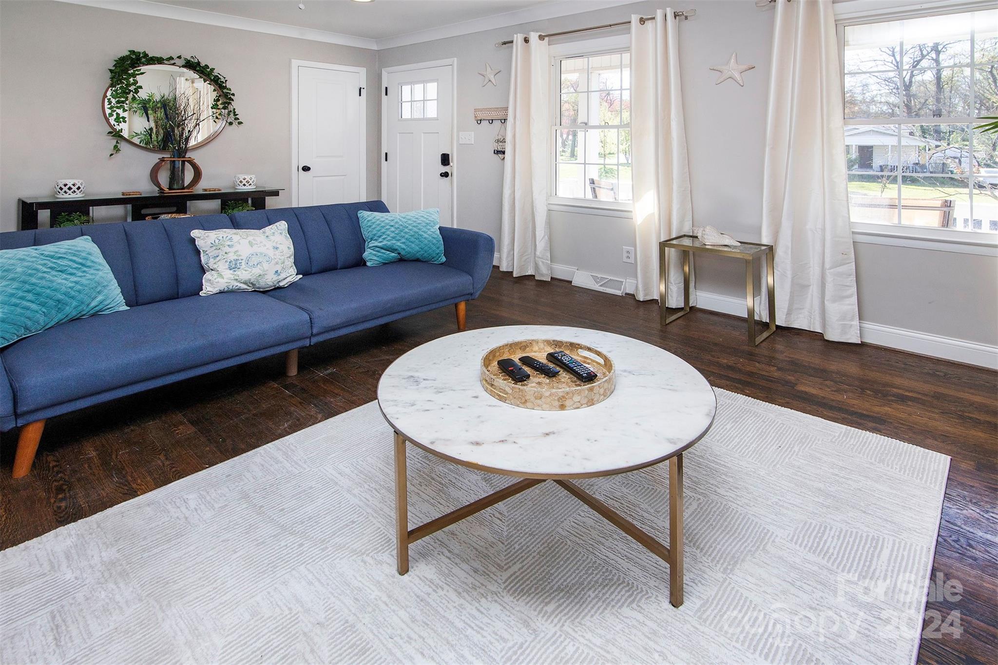 3741 Woodleaf Road Charlotte, NC 28205 - Photo 5 of 31 a living room with furniture and a window