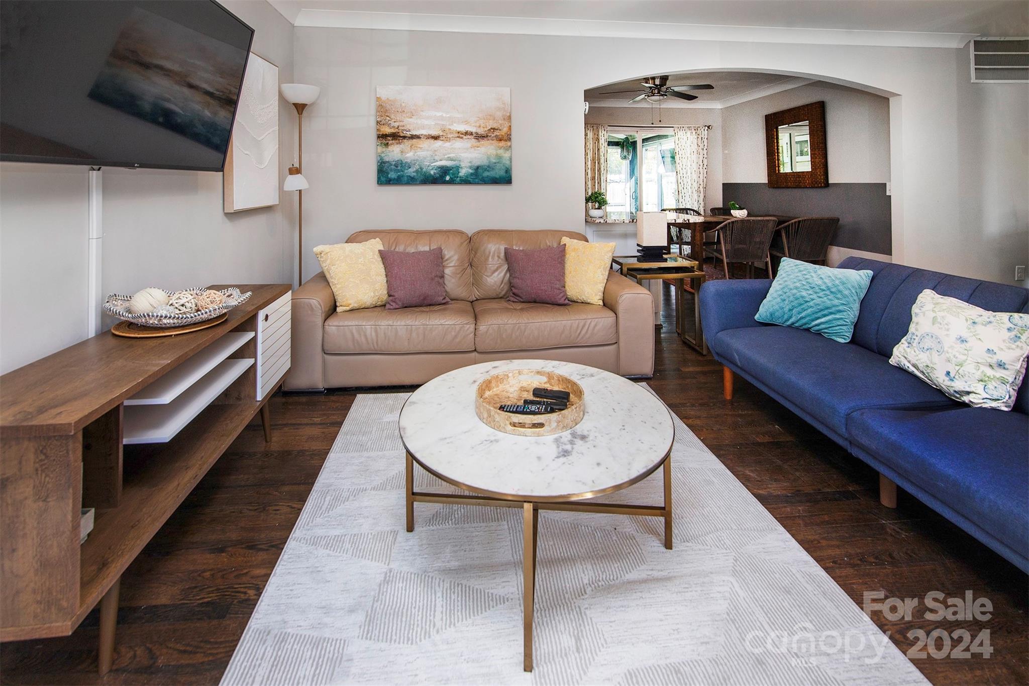 3741 Woodleaf Road Charlotte, NC 28205 - Photo 6 of 31 a living room with furniture and wooden floor