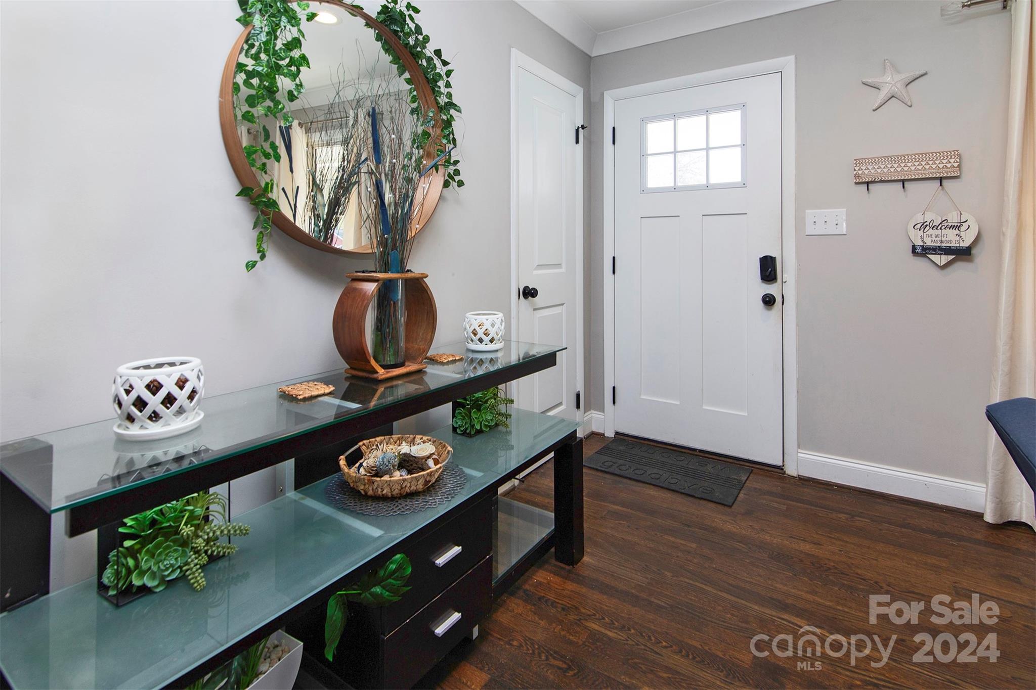 3741 Woodleaf Road Charlotte, NC 28205 - Photo 7 of 31 a room with furniture and wooden floor
