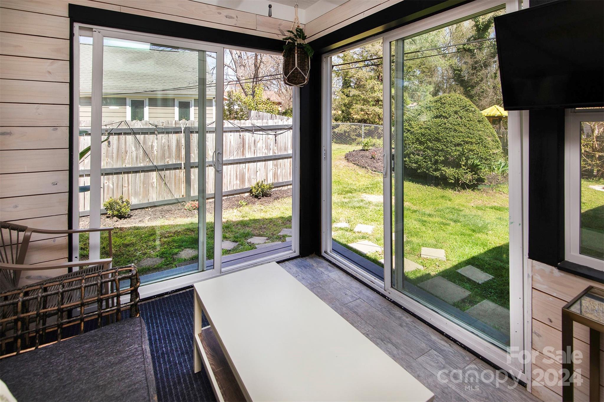 3741 Woodleaf Road Charlotte, NC 28205 - Photo 10 of 31 a view of a city from a balcony