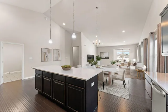 a room with lots of counter space and painting on the wall