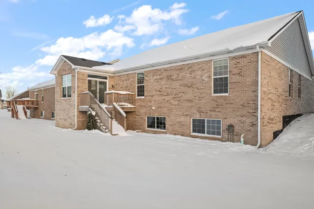 a view of a house with a street