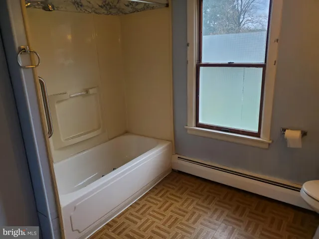 a bathroom with a bathtub