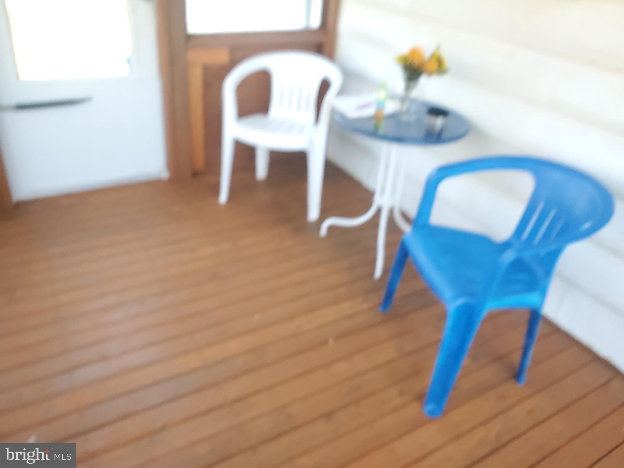 203 Gorton Road Moshannon, PA 16859 - Photo 14 of 16 a view of a dining room with furniture and wooden floor