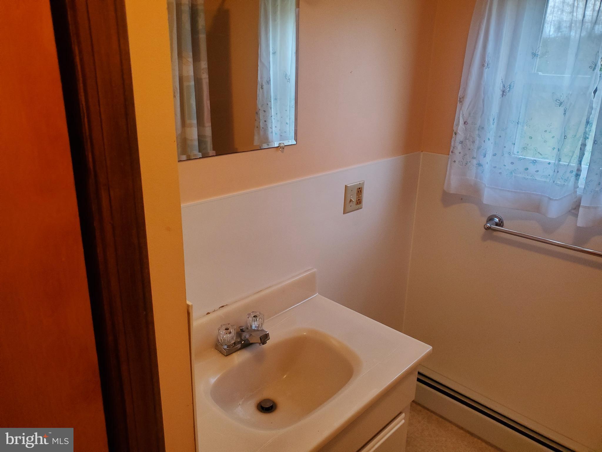 203 Gorton Road Moshannon, PA 16859 - Photo 10 of 16 a bathroom with a sink and a mirror