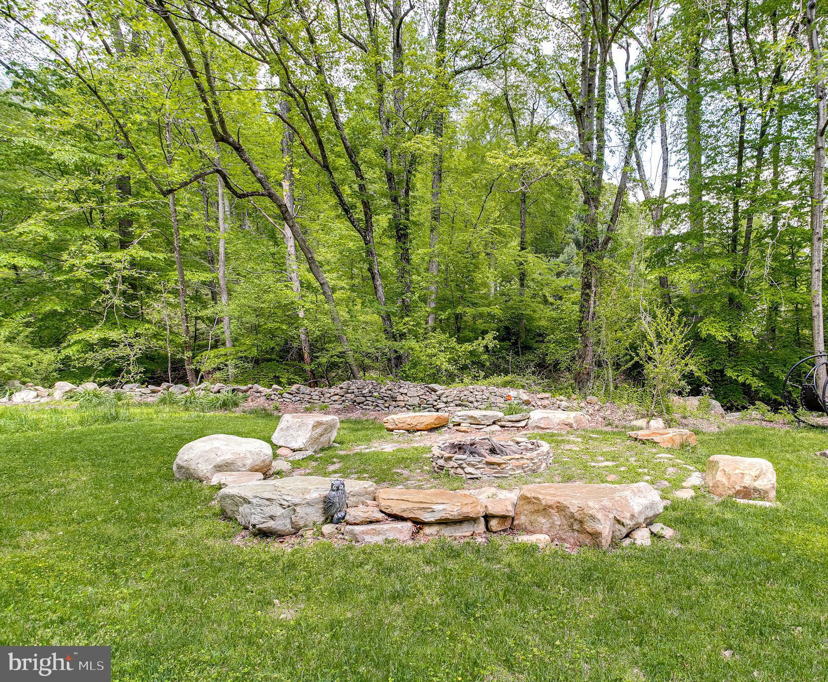 9033 Hamburg Road Frederick, MD 21702 - Photo 2 of 31 Firepit w/ Stone Boulder Seating