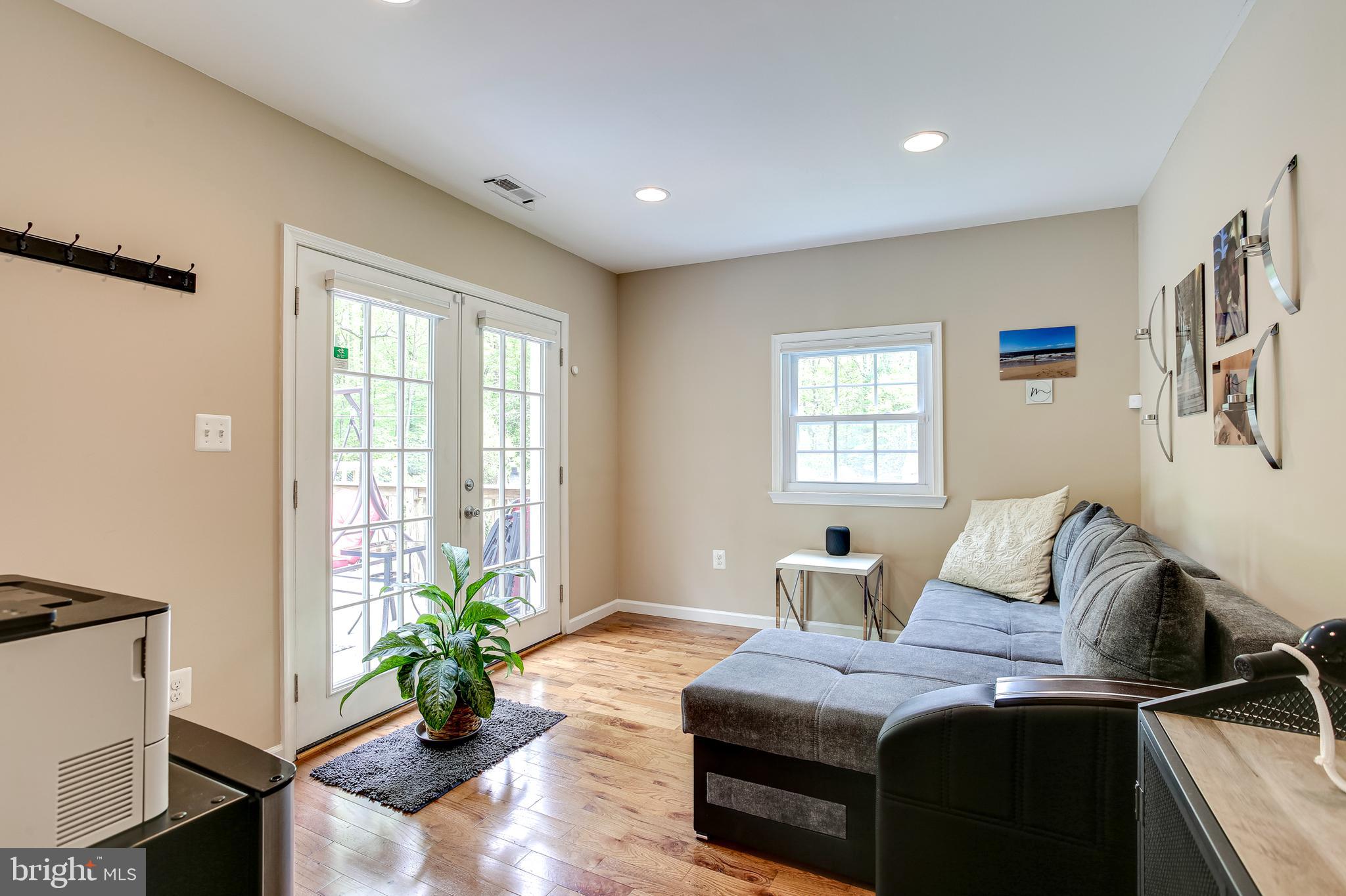 9033 Hamburg Road Frederick, MD 21702 - Photo 14 of 31 Den w/ French Doors Out to Deck