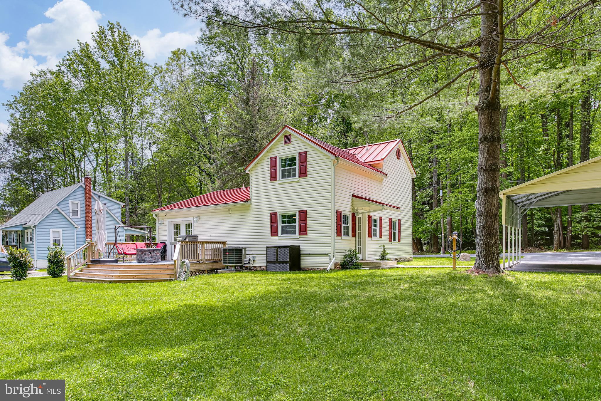 9033 Hamburg Road Frederick, MD 21702 - Photo 4 of 31 Expansive Rear Yard w/ Deck & Carport