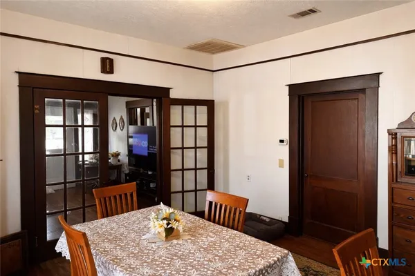 a view of a dining room with furniture