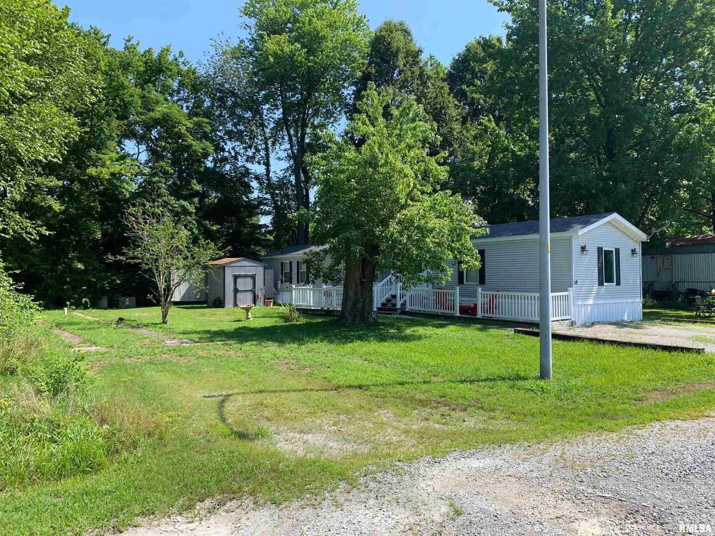 5281-5287 Country Club Road, Unit 1 2 Murphysboro, IL 62966 - Photo 34 of 50 a house view with a sitting space and garden