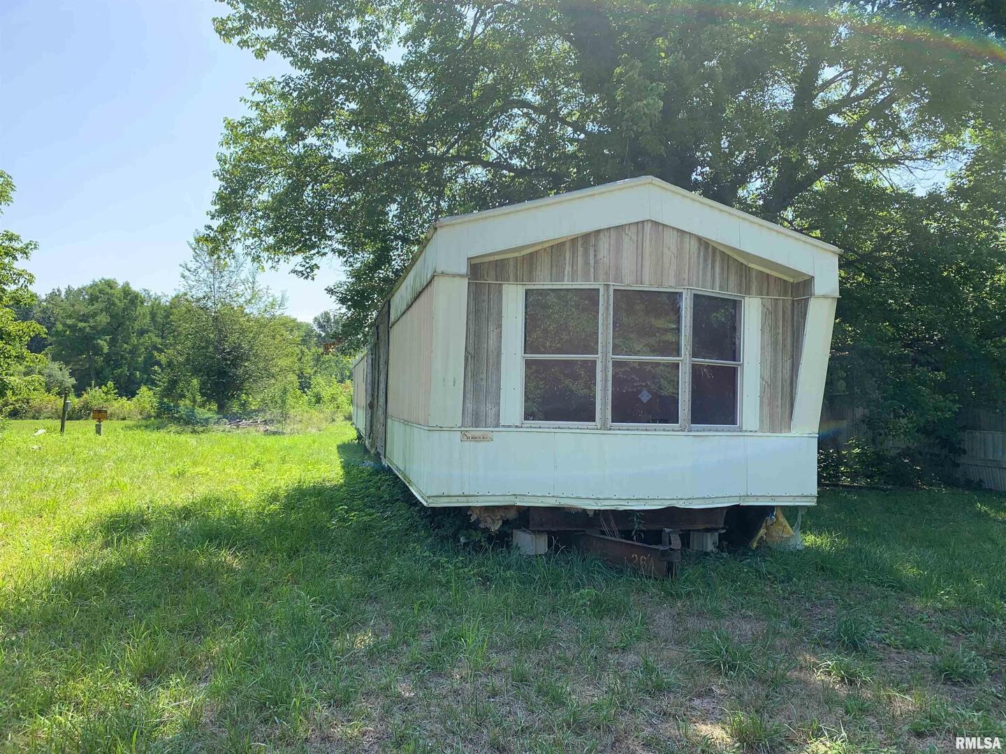 5281-5287 Country Club Road, Unit 1 2 Murphysboro, IL 62966 - Photo 37 of 50 a view of an house with backyard space and garden