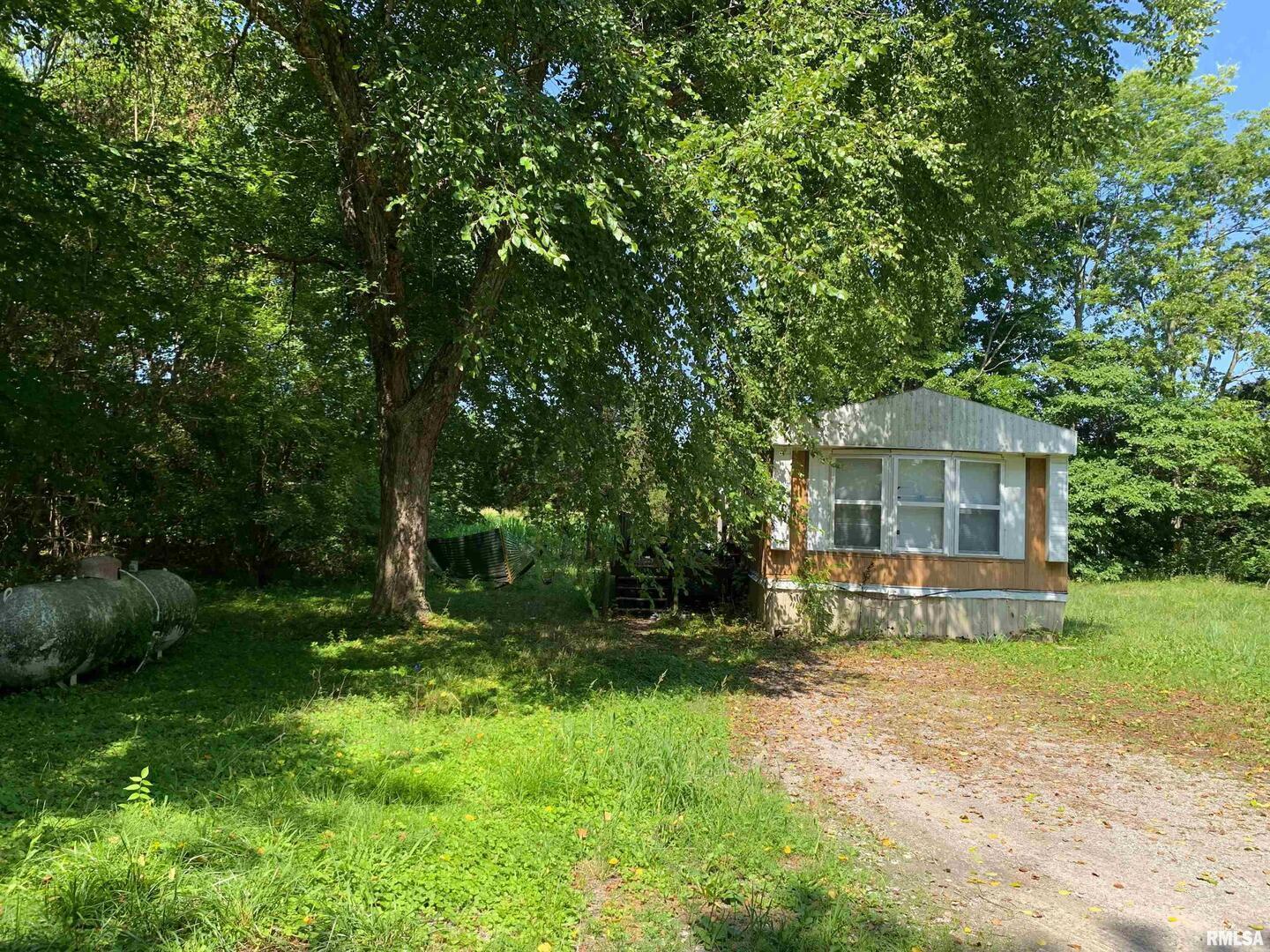 5281-5287 Country Club Road, Unit 1 2 Murphysboro, IL 62966 - Photo 39 of 50 a front view of a house with garden