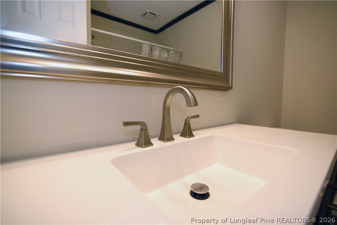 1673 Norment Road Lumberton, NC 28360 - Photo 28 of 32 a close view of sink and tap