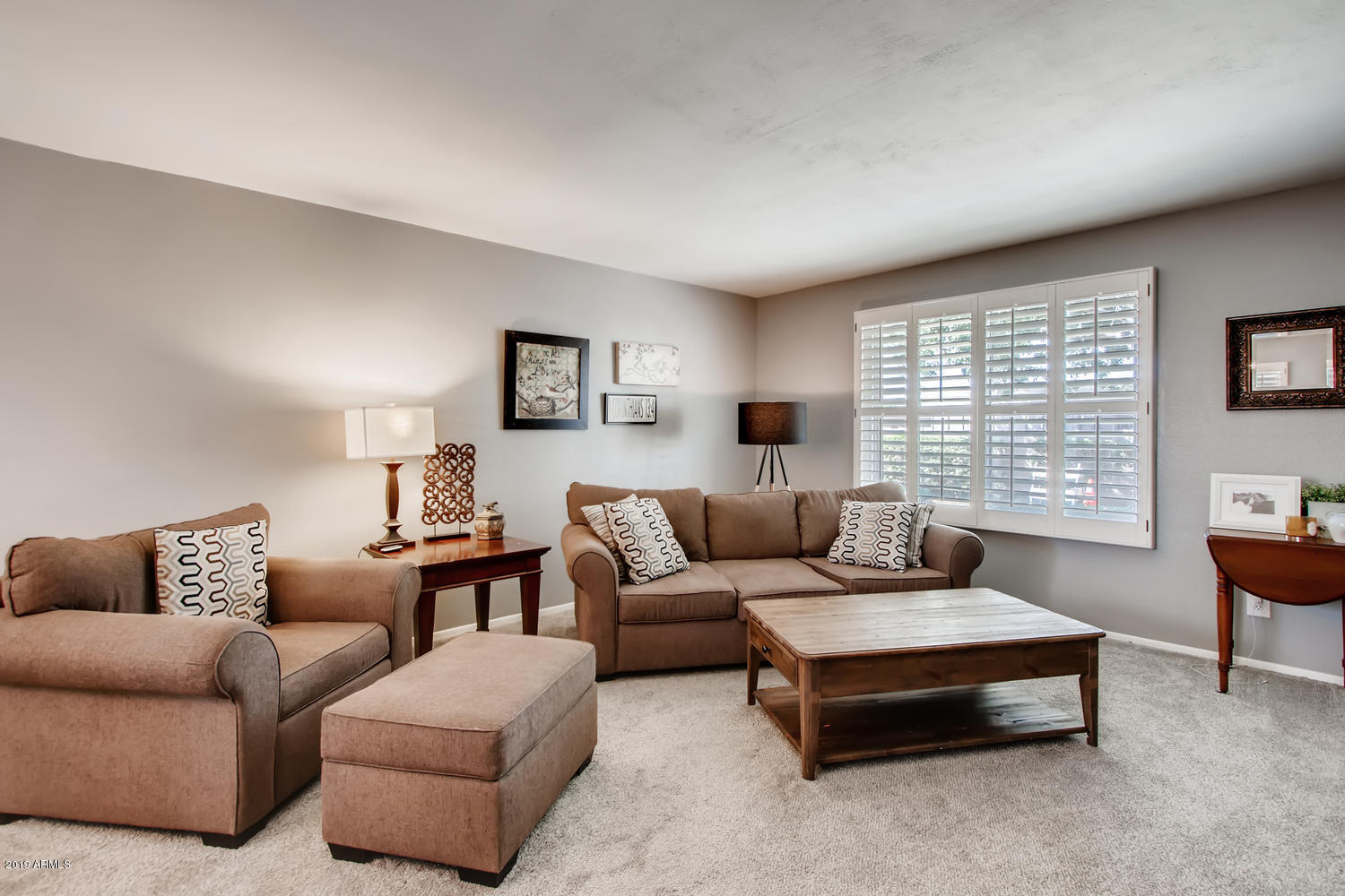 5945 East Thomas Road Scottsdale, AZ 85251 - Photo 2 of 33 a living room with furniture and a large window