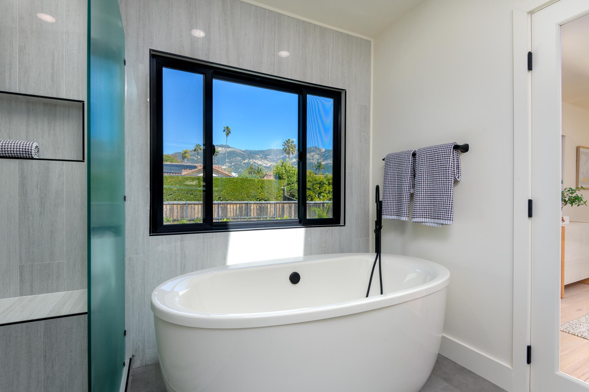 3816 Sunset Road Santa Barbara, CA 93110 - Photo 24 of 38 a white bath tub sitting next to a window