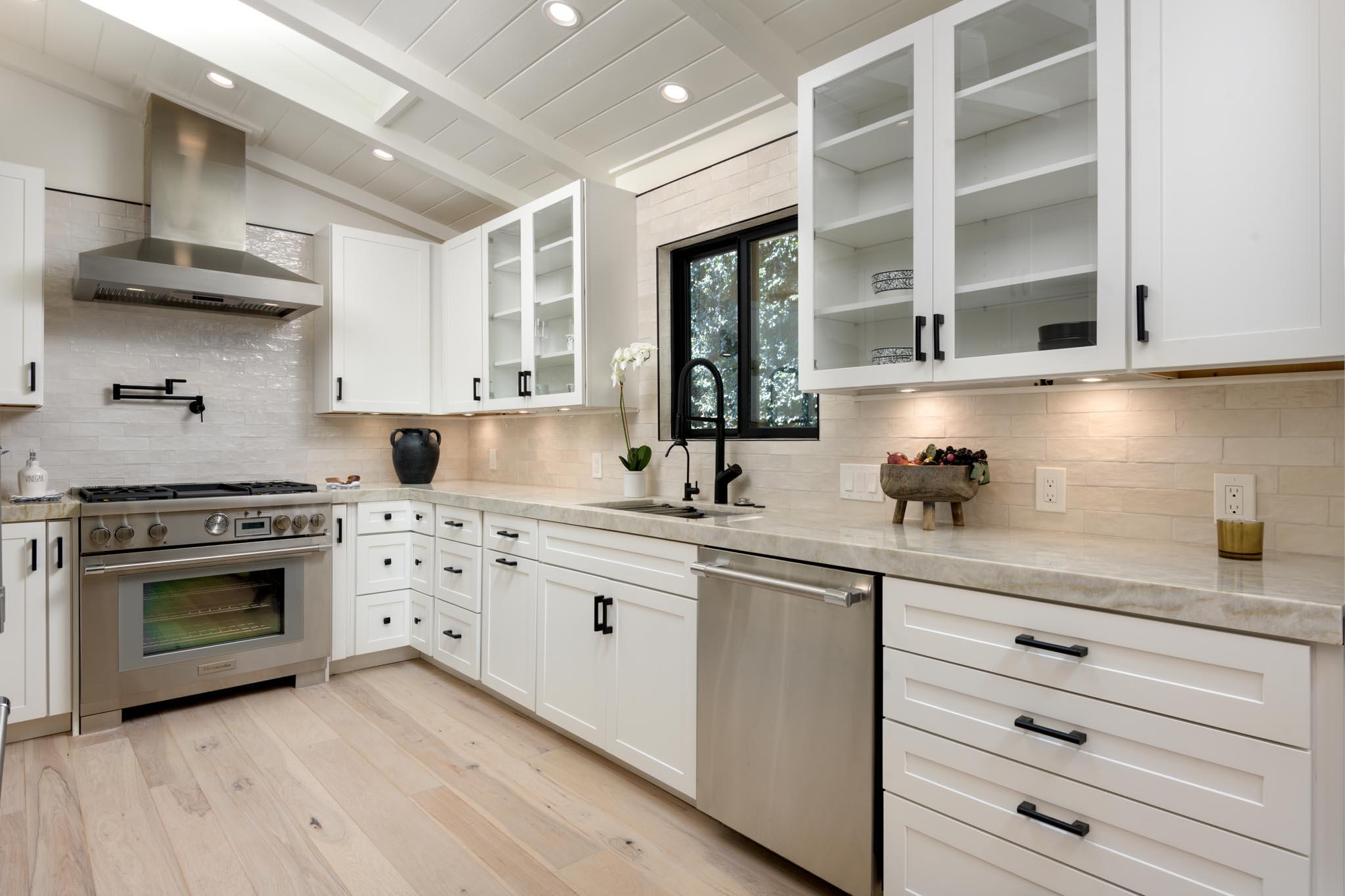 3816 Sunset Road Santa Barbara, CA 93110 - Photo 37 of 38 a kitchen with granite countertop a sink stainless steel appliances and cabinets