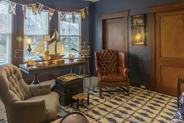 a kitchen with a stove and a refrigerator