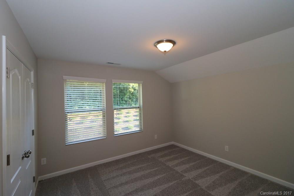 1718 Still River Way, Unit 7 Fort Mill, SC 29708 - Photo 14 of 21 an empty room with a window