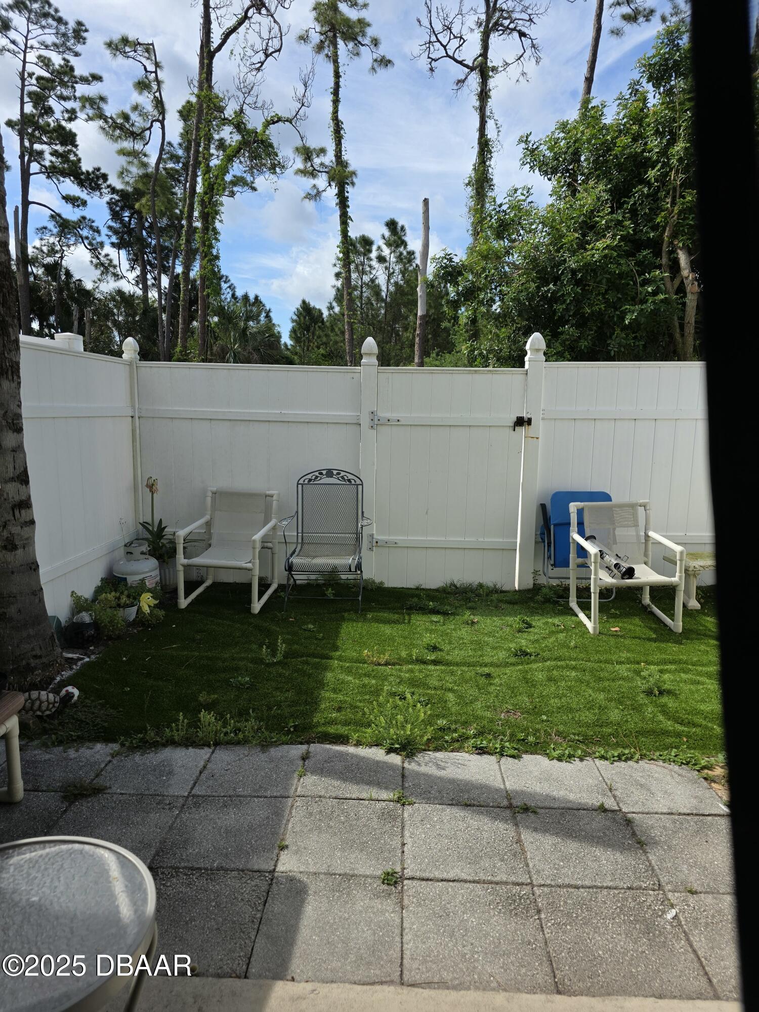 480 Reed Canal Road, Unit 55 South Daytona, FL 32119 - Photo 25 of 30 Rear fenced Patio