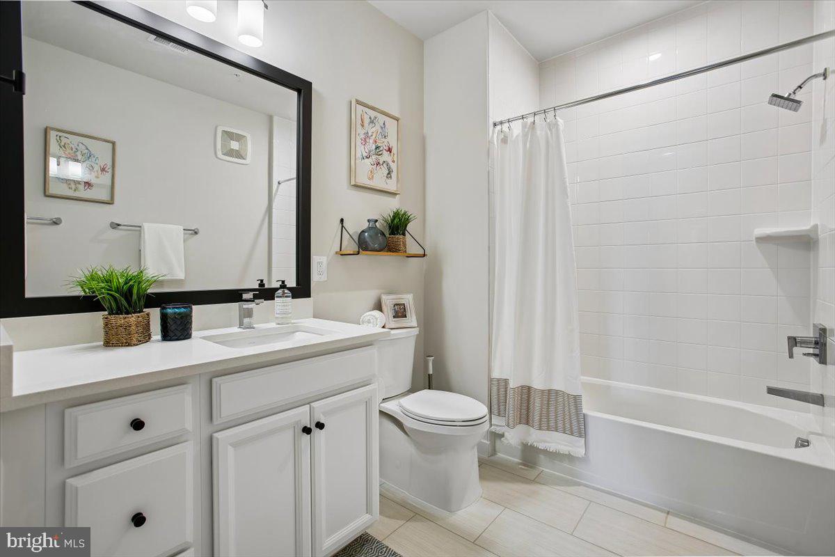 1669 Bandit Loop, Unit 105A Reston, VA 20190 - Photo 33 of 58 2nd Full Bath w/Tub-Shower, Custom Tile