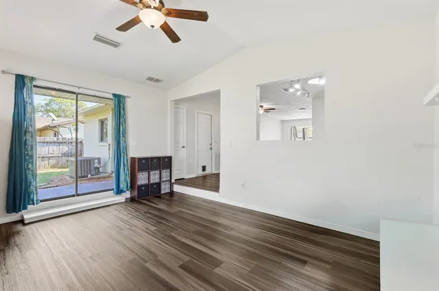 a view of livingroom and hardwood floor