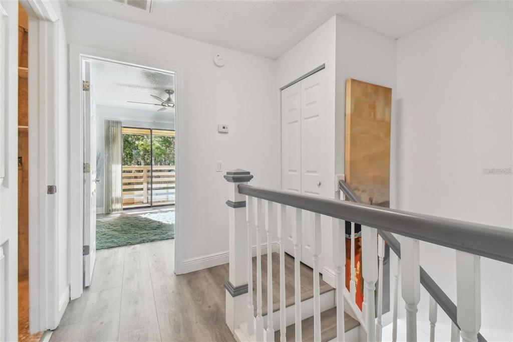 4427 Dylan Loop, Unit 190 Land O' Lakes, FL 34639 - Photo 15 of 26 a view of a hallway with wooden floor and entryway