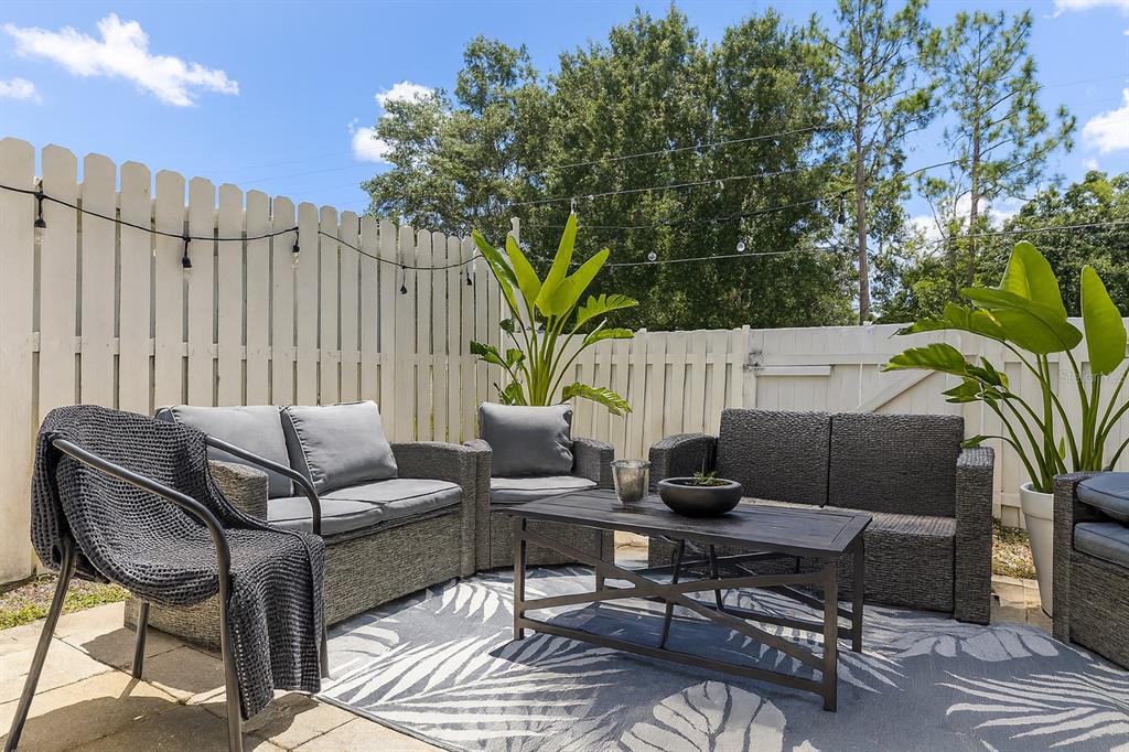 4427 Dylan Loop, Unit 190 Land O' Lakes, FL 34639 - Photo 4 of 26 a outdoor living space with furniture and a potted plant