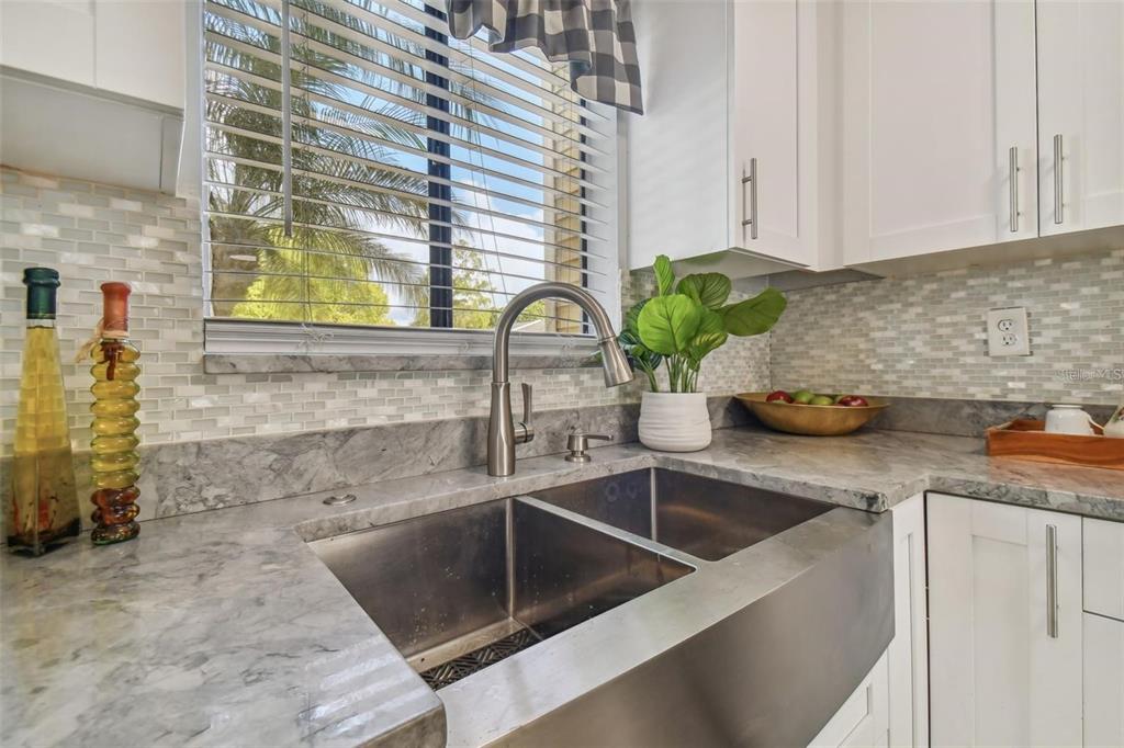 4427 Dylan Loop, Unit 190 Land O' Lakes, FL 34639 - Photo 8 of 26 a kitchen with a sink and a window