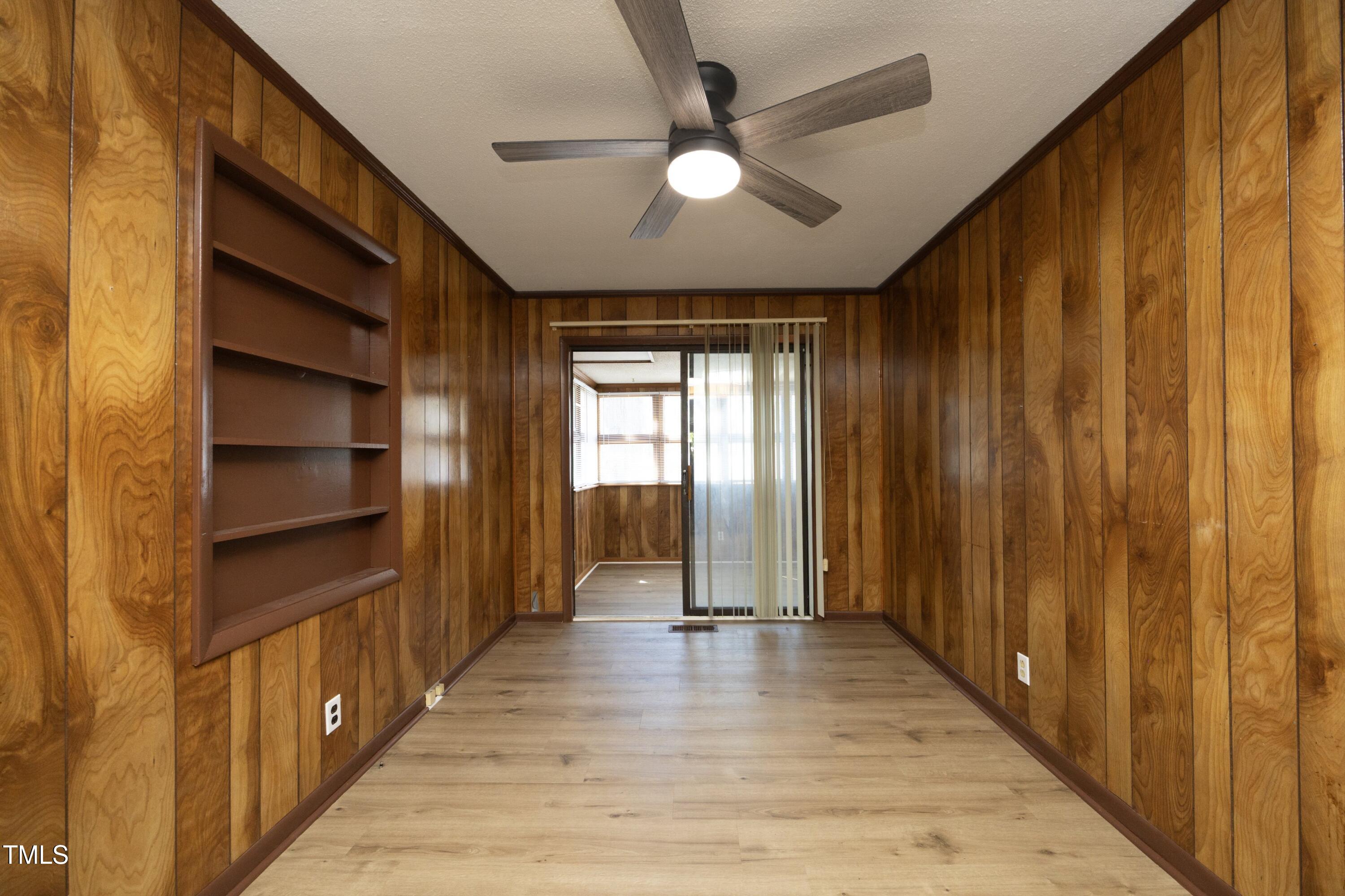608 Cecil Street Durham, NC 27707 - Photo 13 of 31 a view of a hallway with wooden floor and staircase