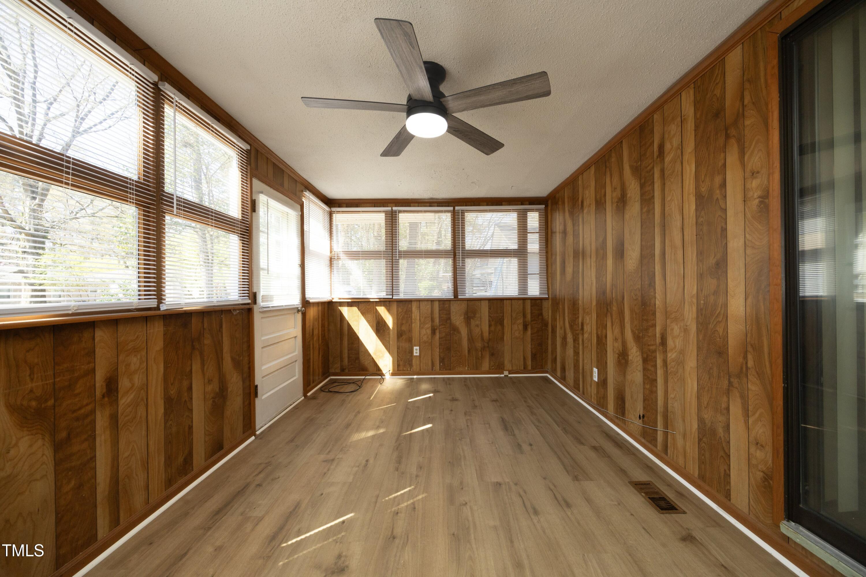 608 Cecil Street Durham, NC 27707 - Photo 15 of 31 a view of an empty room with a window
